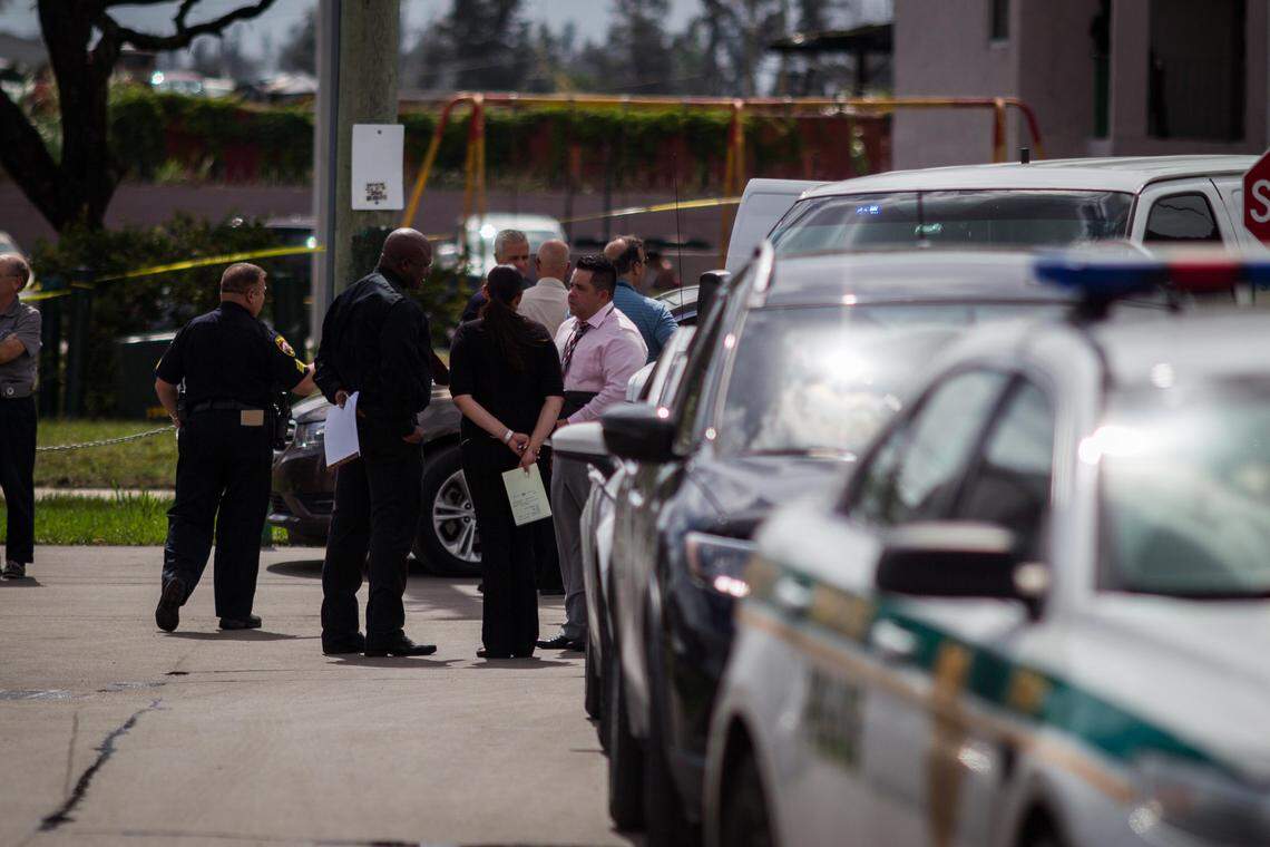 Miami-Dade Police Department investigates the scene after a suspect was shot by an officer at Glorieta Gardens in Opa-locka on Wednesday, May 23, 2018.