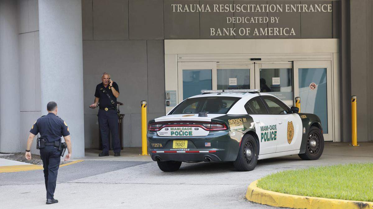Police officers arrive at Ryder Trauma Center at Jackson Memorial Hospital after two Miami police officers were shot while responding to a call on a shooting on Thursday morning, Oct. 9, 2025, in Allapattah. 