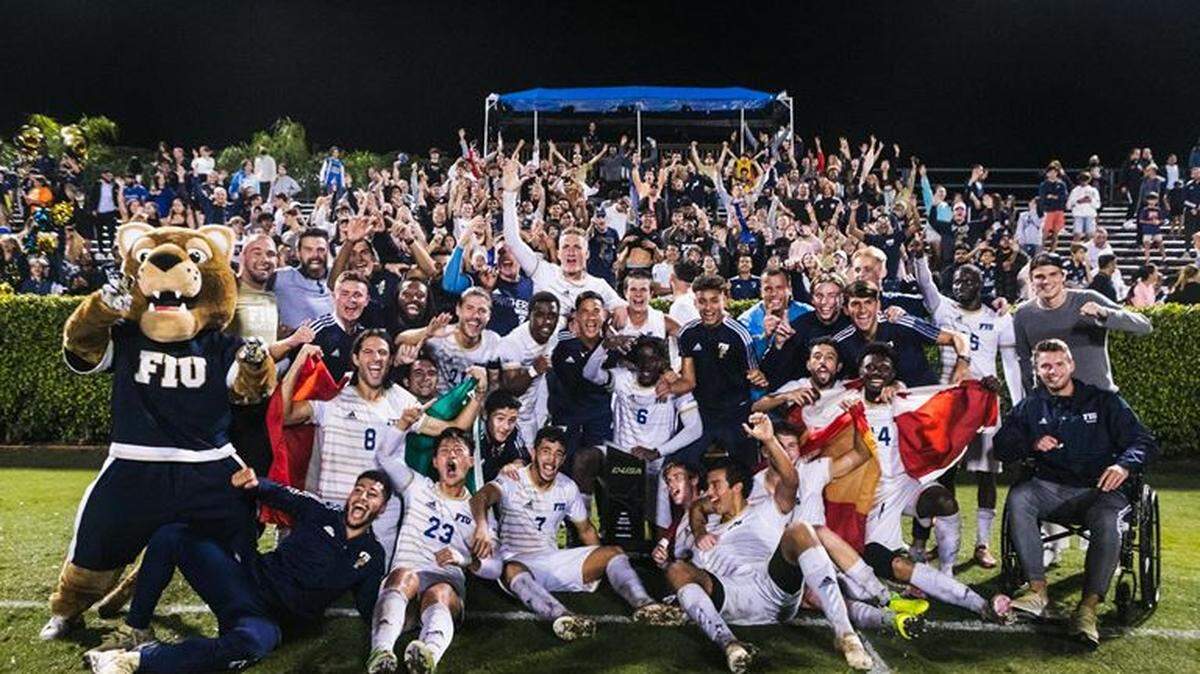The 18th-ranked FIU men’s soccer team celebrates after beating No. 1 ranked and defending NCAA champion Marshall 4-1 to win the Conference USA regular season title on Nov. 5, 2021.