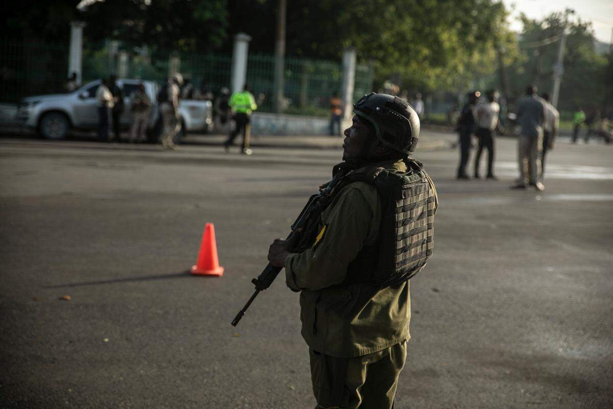 A member of the armed forces patrols the area where Haitian Prime Minister Ariel Henry attends a ceremony marking the death anniversary of revolutionary leader Jean-Jacques Dessalines at the National Pantheon Museum in Port-au-Prince, Haiti, Monday, Oct. 17, 2022.