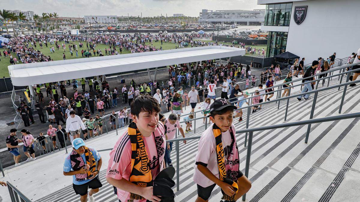 Fans arrive to watch the MLS soccer match between Inter Miami CF and Austin FC at Nu Stadium in Miami Freedom Park on April 4, 2026, in Miami.