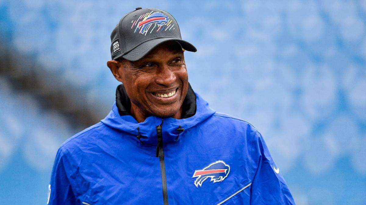 FILE - Buffalo Bills defensive coordinator Leslie Frazier walks on the field before an NFL football game against the Houston Texans, on Oct. 3, 2021, in Orchard Park, N.Y. Frazier is credited for providing the Bills a calm and reassuring voice even at the the most troubling times. (AP Photo/Adrian Kraus, File)