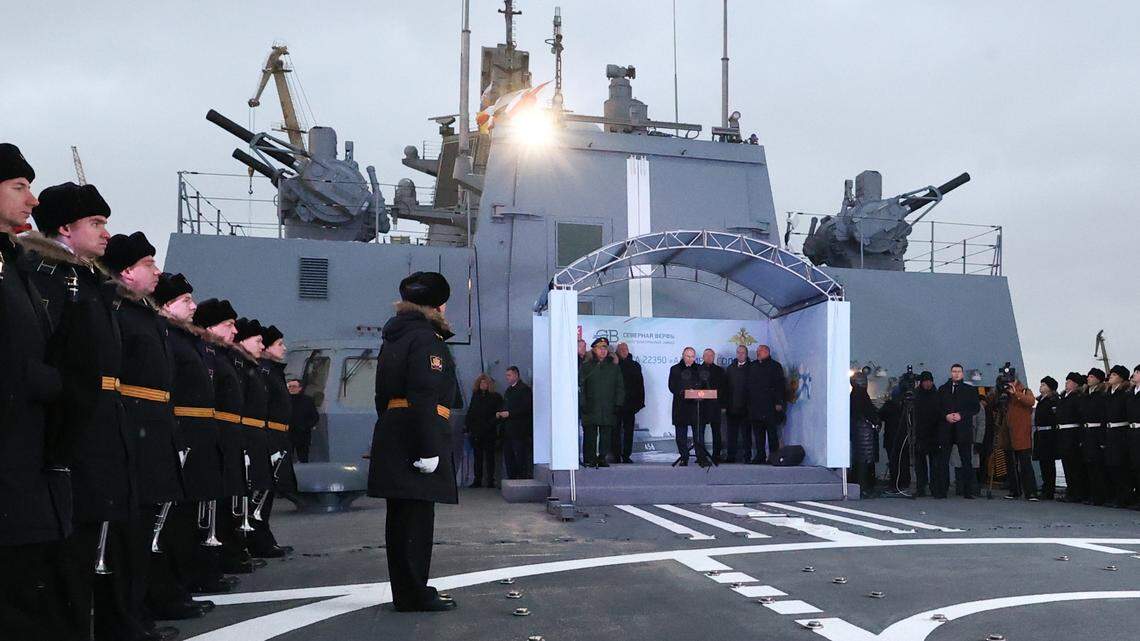 RUSSIA, ST PETERSBURG - DECEMBER 25, 2023: Russia’s President Vladimir Putin (C) attends a ceremony to raise a Russian naval ensign at the Admiral Golovko frigate as the ship joins the Russian Northern Fleet, at the Severnaya Verf shipyard. Sergei Karpukhin/TASS/Sipa USA