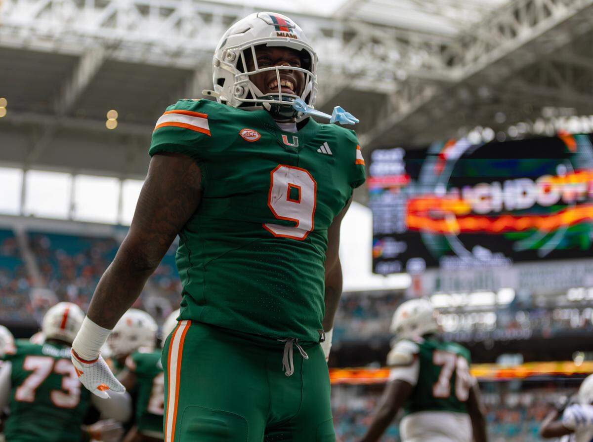 Miami Hurricanes tight end Elija Lofton (9) reacts after teammate Mark Fletcher Jr. (4) scored a touchdown during the second half of an ACC football game against the Duke Blue Devils at Hard Rock Stadium on Saturday, Nov. 2, 2024, in Miami Gardens, Fla.