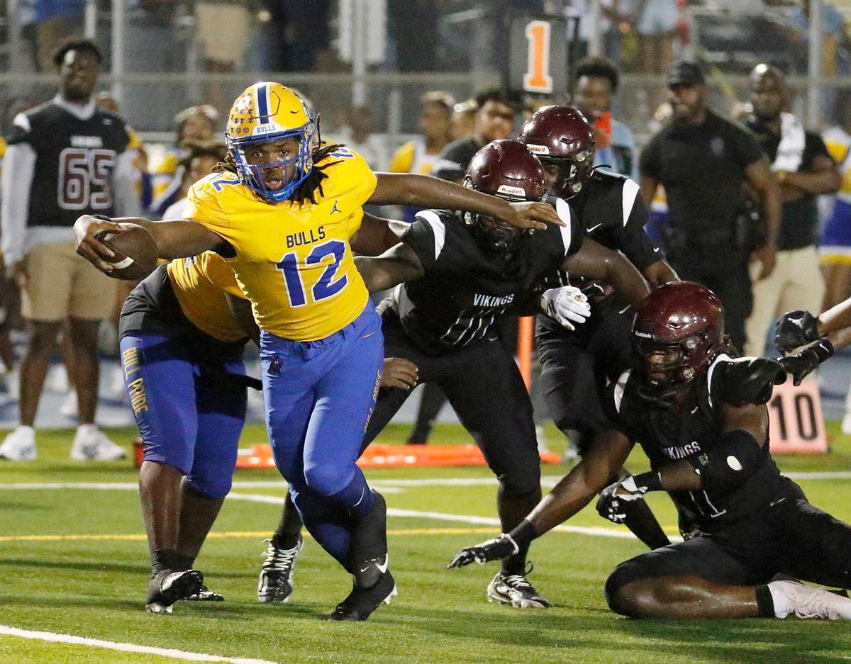 Northwestern Bulls quarterback Leon Strawder (12) runs to score against Norland Vikings during football game on Friday, September 13, 2024 at Traz Powell Stadium in Miami.