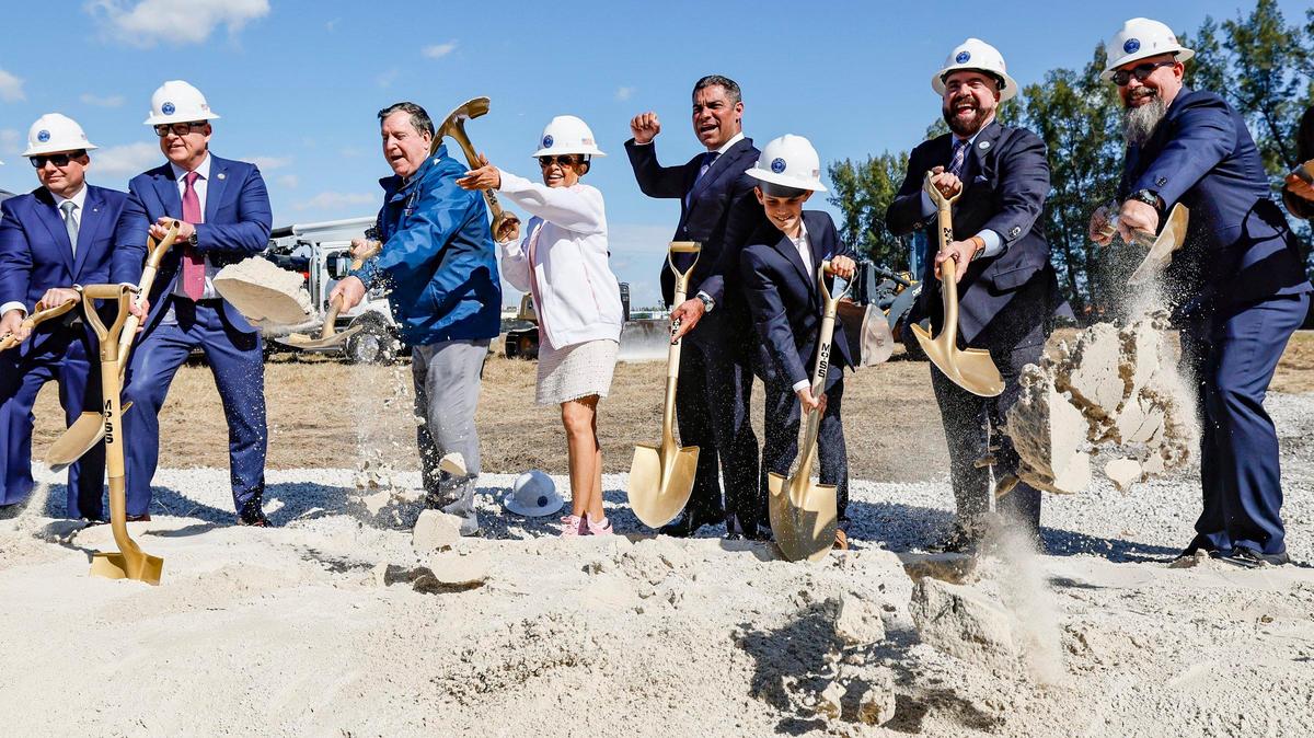 Miami City Mayor Francis Suarez, at center, pumps his fist, during the ground-breaking ceremony after delivering his final State of the City address at the former Melreese Golf Course, the future site of Miami Freedom Park under construction, in Miami on Jan. 15, 2025.
