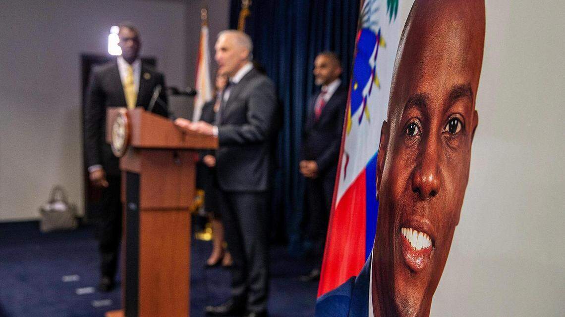 Assistant Attorney General Matthew G. Olsen (on podium) of the Justice Department’s National Security Division joined the U.S. Attorney Markenzy Lapointe (far left) as they announce significant developments in the U.S. government’s prosecution of individuals allegedly connected to the assassination of Haitian President Jovenel Moïse on July 7, 2021. They include arrests and charges against individuals who are South Florida residents. The announcement occured at the James Lawrence King Criminal Justice Building in Miami on Tuesday, February 14, 2023.