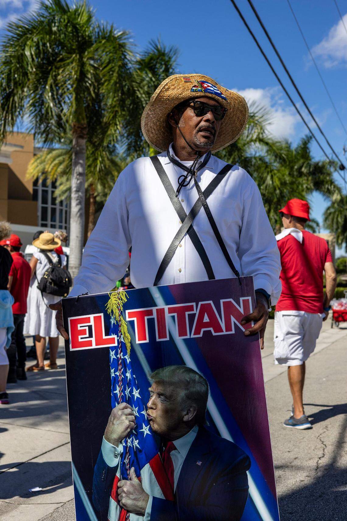 Santiago Ferran Barnet, dressed as a Mambí, a Cuban freedom fighter from the late 1890’s, shows off a poster of his favorite president.