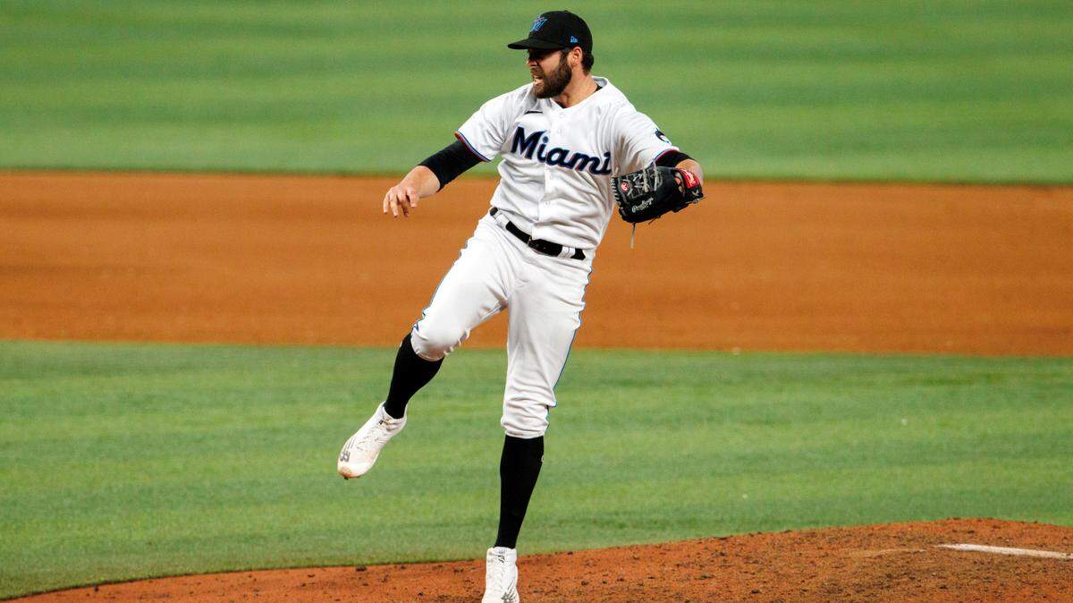 Miami Marlins relief pitcher Dylan Floro (36) reacts after a pitch during the ninth inning of a baseball game against the Pittsburgh Pirates at LoanDepot Park on Thursday, July 14, 2022 in Miami, Florida.