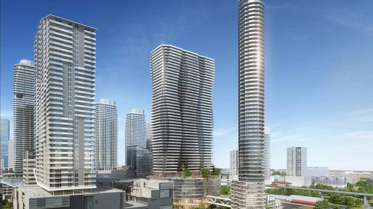 An architectural rendering shows the two proposed new towers for Brickell City Centre to the right of the existing three-block complex.
