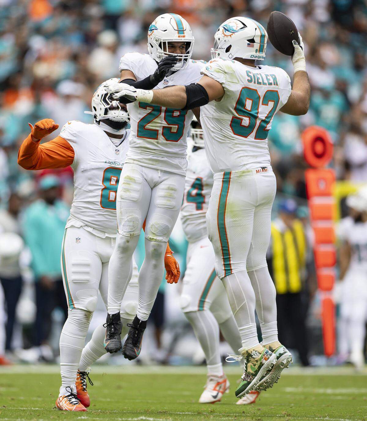 Miami Dolphins defensive tackle Zach Sieler (92) celebrates after recovering a New Orleans Saints fumble in the first half of their NFL game at Hard Rock Stadium on Sunday, Nov. 30, 2025, in Miami Gardens, Fla.