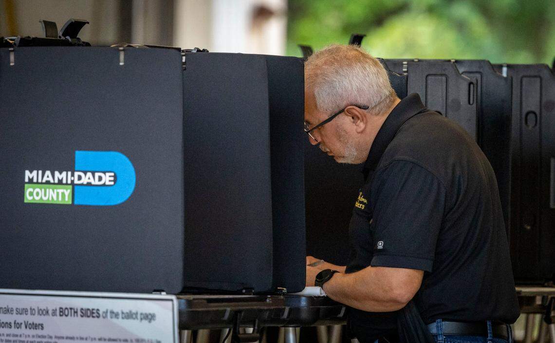 Miami, Florida, November 5, 2024 - A voter fills out his ballot at Miami-Dade County Fire Station #44, 7700 NW 186 St.