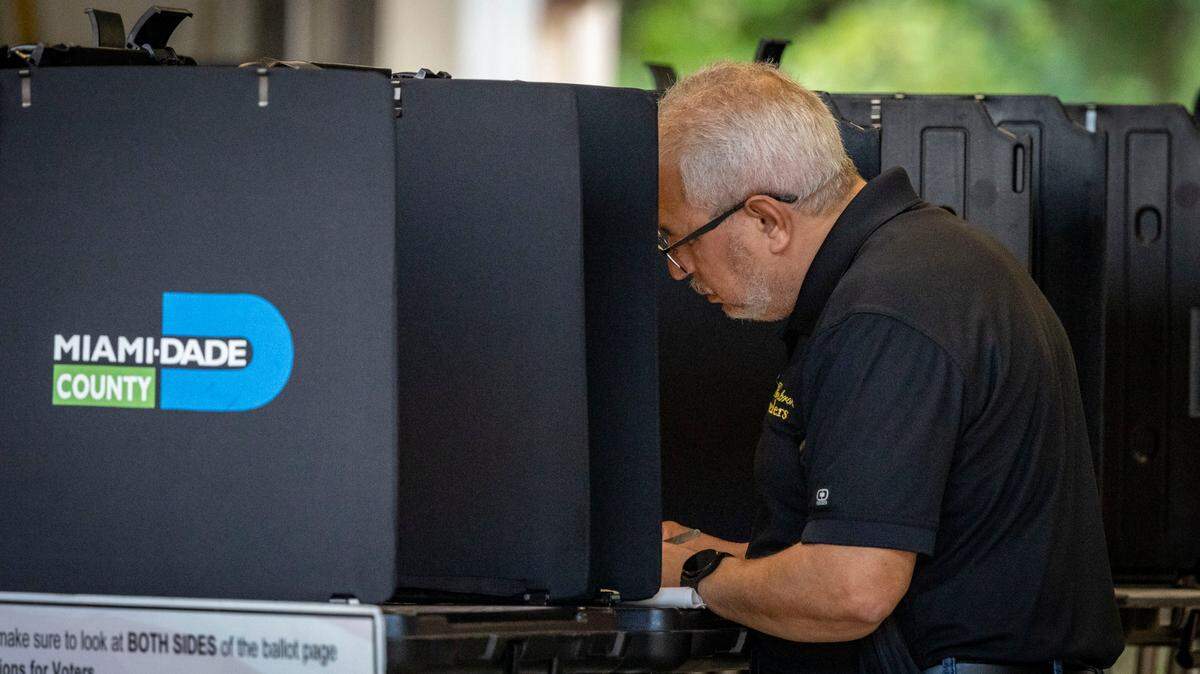 Miami, Florida, November 5, 2024 - A voter fills out his ballot at Miami-Dade County Fire Station #44, 7700 NW 186 St.