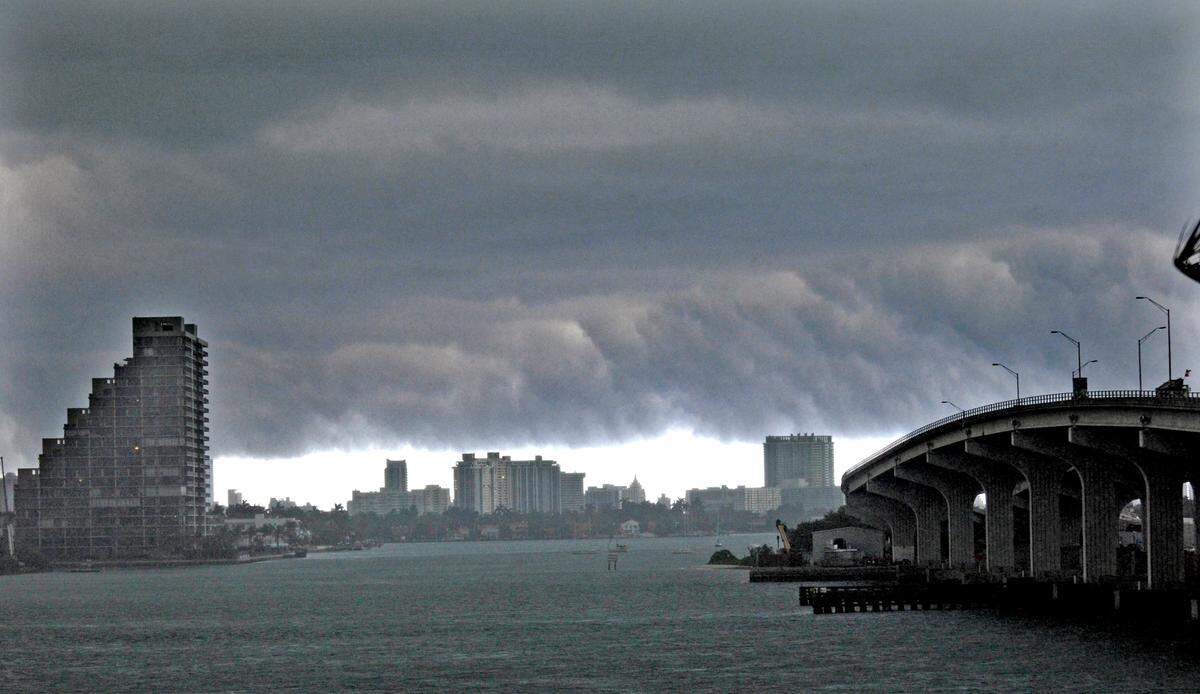 This April 5, 2011 file photo of Biscayne Bay, looking toward South Beach, showed a line of scattered showers and thunderstorms. That view could repeat March 15 and 16, 2022 in South Florida as the National Weather Service forecasts storms.
