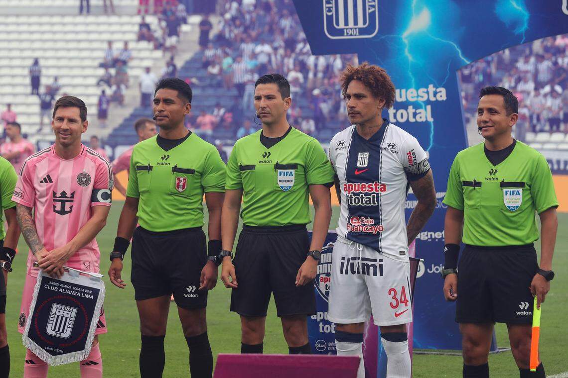 LIMA, PERU - JANUARY 24: Lionel Messi of Inter Miami poses with referees and Paolo Guerrero of Alianza Lima during a friendly match between Alianza Lima and Inter Miami at Estadio Alejandro Villanueva on January 24, 2026 in Lima, Peru. (Photo by Mariana Bazo/Getty Images)