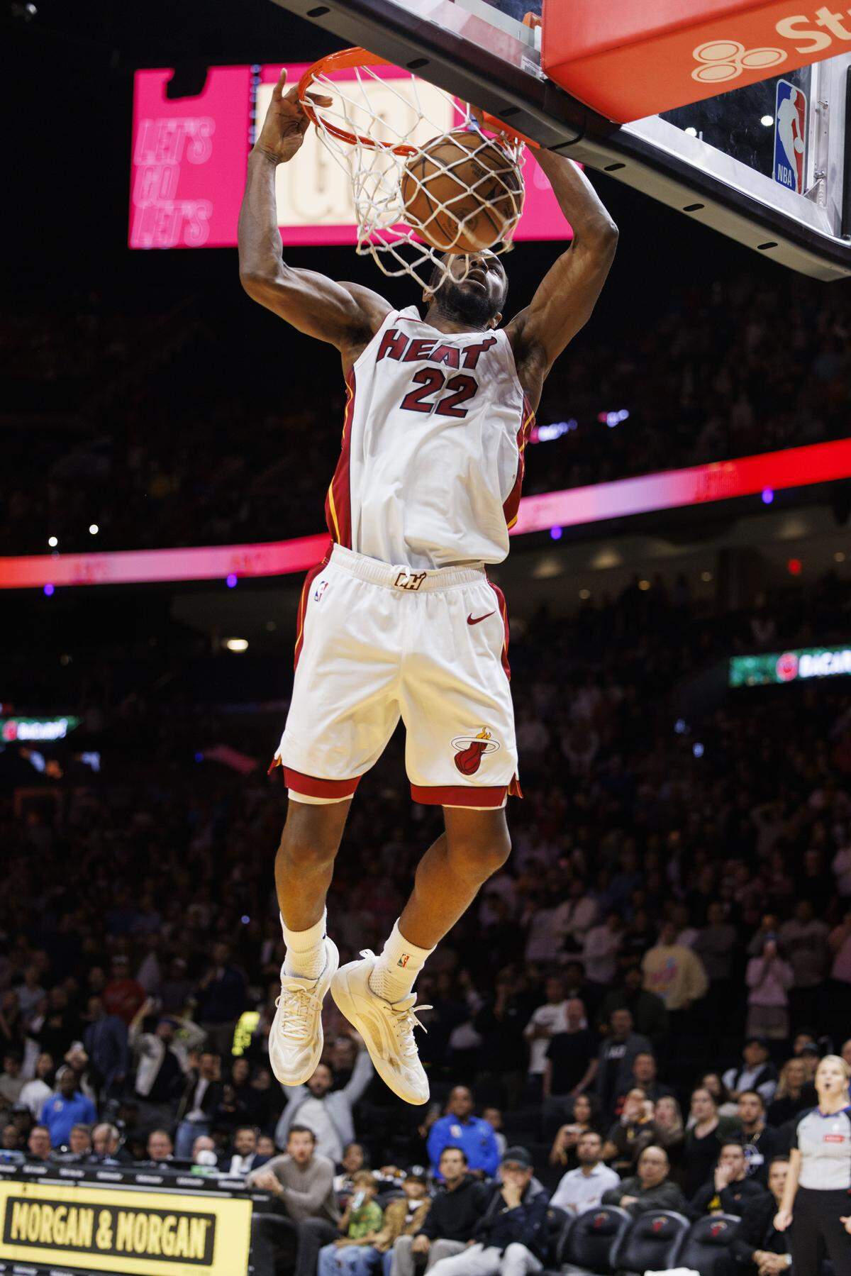 Miami Heat forward Andrew Wiggins (22) dunks the basket in the final second during overtime of a game for the win against the Cleveland Cavaliers on Monday, Nov. 10, 2025, at the Kaseya Center in downtown Miami, Fla.