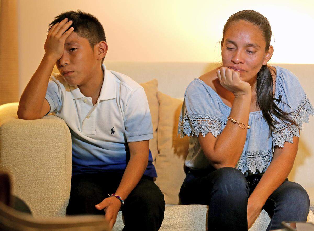 Geremy, an 11-year-old boy talks to the media after he was reunited with his mother, Otila Asig-Putul, after being separated for two months at the U.S.-Mexico border as they tried to enter the country illegally in May, July 16, 2018. The family is now suing the U.S. government after they say the boy was bullied in the Chicago shelter. HIs injuries were so bad that his head was “cracked open” and he needed staples.