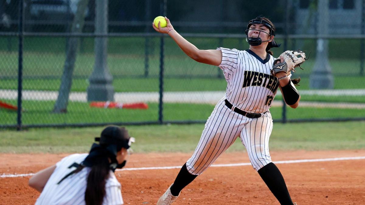 Western Wildcats catcher Jade Castillo (13) throws to first base during the game against Coral Springs Charter during the BCAA Big 8 softball championship game at Pompano Beach Community Park in Pompano Beach on Thursday, April 27, 2023.