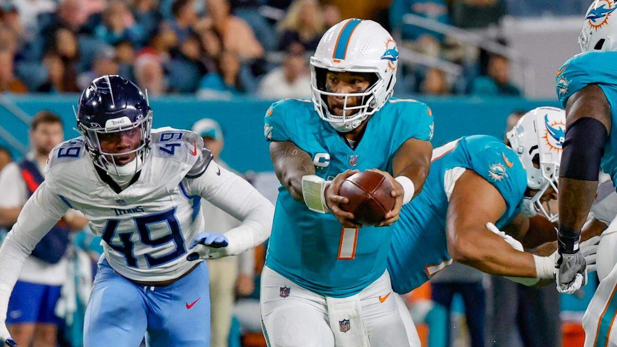 Miami Dolphins quarterback Tua Tagovailoa (1) prepares to pitch the ball during the game against the Tennessee Titans in the first quarter at Hard Rock Stadium in Miami Gardens, Florida on Monday, December 11, 2023. 
