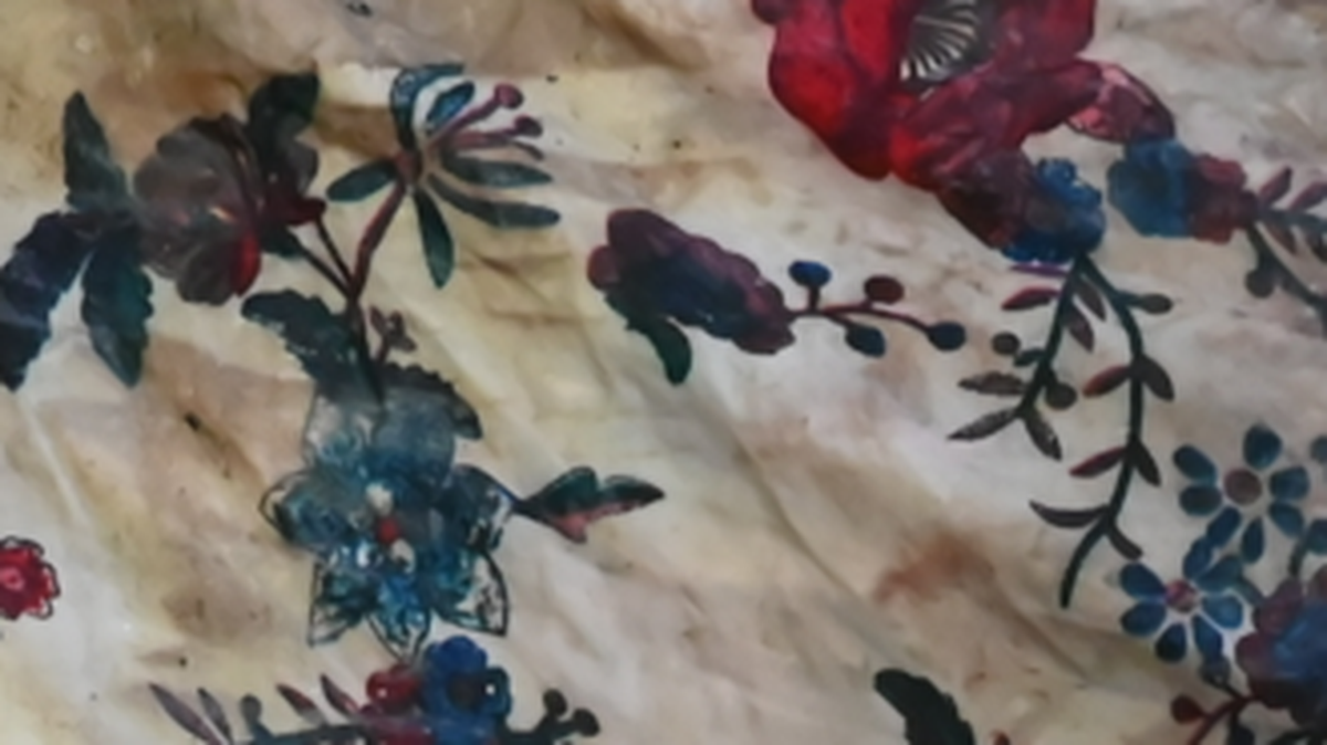 The remains of a woman were found inside three suitcases along the Intracoastal Waterway in Delray Beach, FL on July 23, 2023. Police say the woman was wearing a floral tank top (pictured above) with a black undershirt and black mid-thigh shorts.