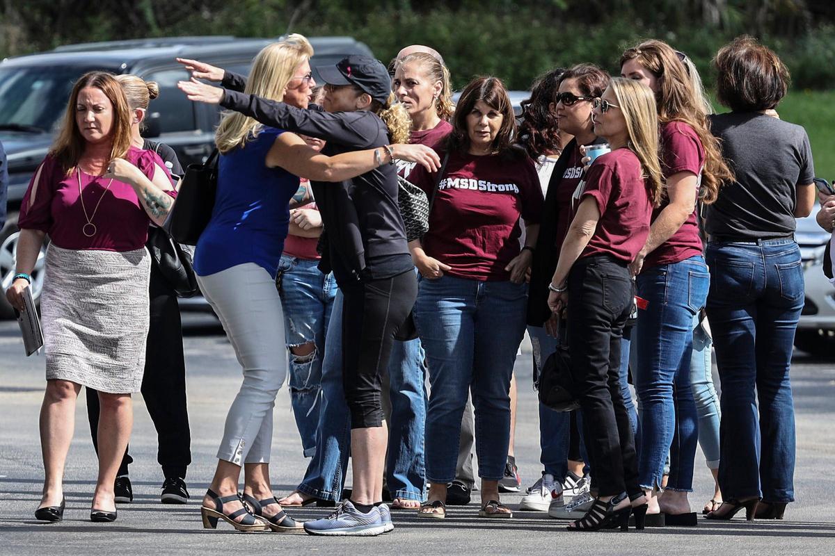 Parents of Parkland Mass Shooting Victims greet one another prior holding a press conference to stand together in opposition of the potential reinstatement of Scott Israel as BSO sheriff on Monday, October 13, 2019 outside Broward County Sheriff’s Office Substation in Parkland, Florida.
