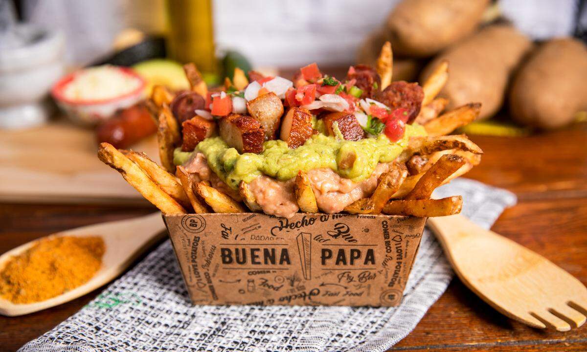 The El Colombiano at Buena Papa Fry Bar includes chicharron, chorizo, beans and guacamole.