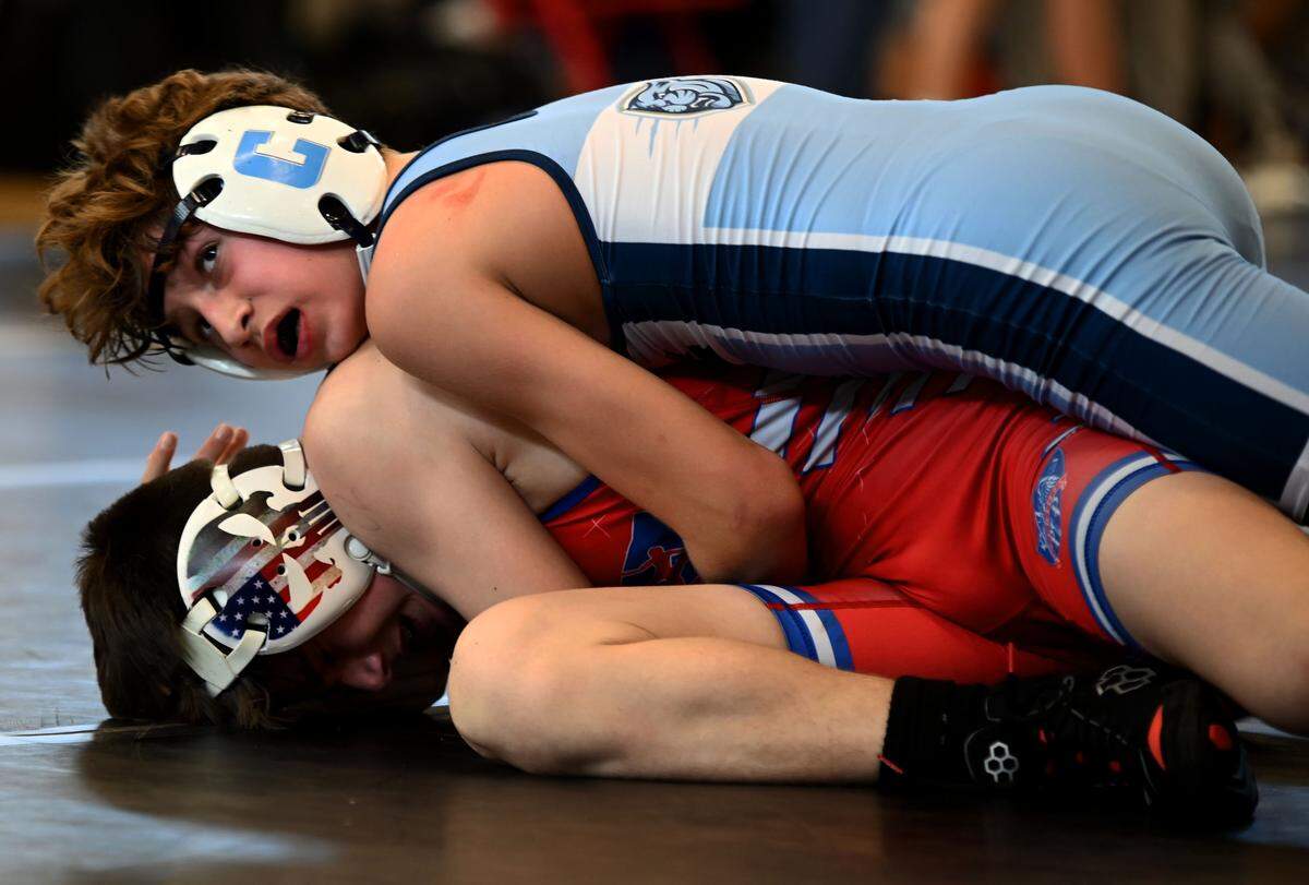 Somerset’s Avner Atyzerov works his way to a 10-5 win over Scotte Bogenrief from Pace in an 106-pound match during Class 2A Duals state semifinal on Saturday at Osceola High School in Kissimmee.