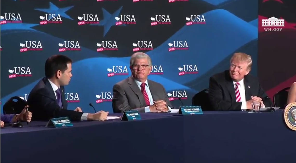 From left to right: U.S. Sen. Marco Rubio, Maximo Alvarez and President Donald Trump talk during a Hialeah tax round table in April.