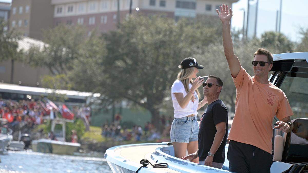 Tampa Bay Buccaneers NFL football quarterback Tom Brady waves to fans as he celebrates their Super Bowl 55 victory over the Kansas City Chiefs with a boat parade in Tampa, Fla., Wednesday, Feb. 10, 2021.