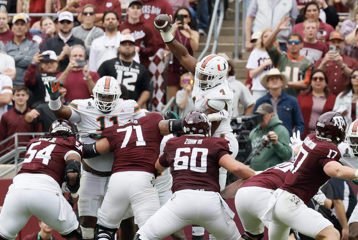 Miami Hurricanes defensive lineman Rueben Bain Jr. (4) blocks a field goal attempt by the Texas A&M Aggies in the first half of the first round of the 2025 College Football Playoff at Kyle Field at College Station, Texas, on Saturday, December 20, 2025.