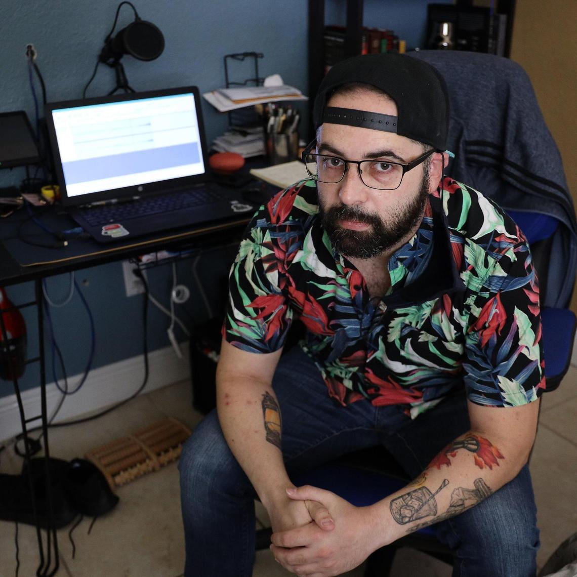 Alejandro Carro, a laid-off bartender, has moved back in with his parents and plans to start a podcast on bartending. He set up a podcasting mic, lights, and laptop in his bedroom hoping to create a revenue stream while many hospitality workers struggle to make a living.