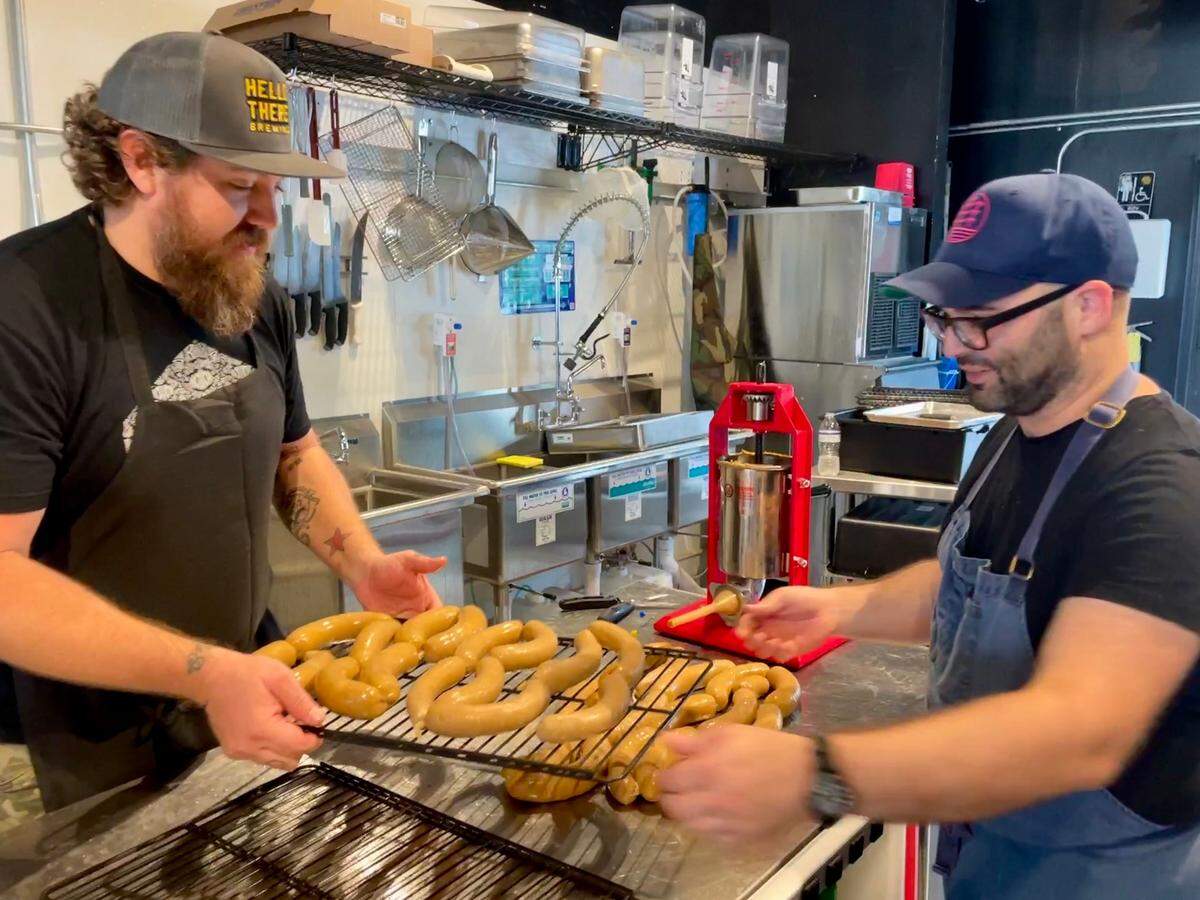 Homemade hot dogs being made at Off Site.