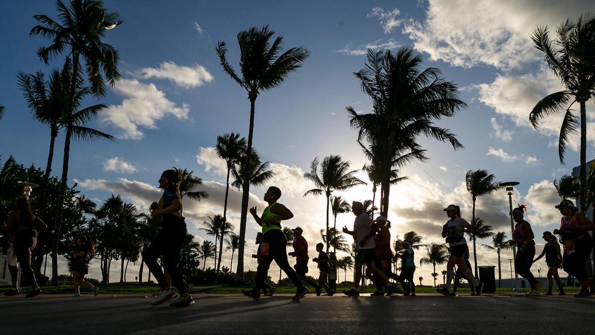 Runners make their way down Ocean Drive toward the Venetian Causeway as they participate in the 18th annual Life Time Miami Marathon and Half Marathon on Sunday, February 9, 2020. There were more than 20,000 combined runners registered for the marathon and half marathon.