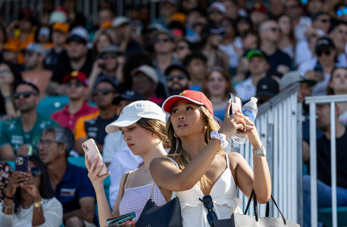 Fans watch as racers participate in a Sprint Qualifying session on the first day of the Formula One Miami Grand Prix at the Miami International Autodrome on Friday, May 2, 2025, in Miami Gardens, Fla.