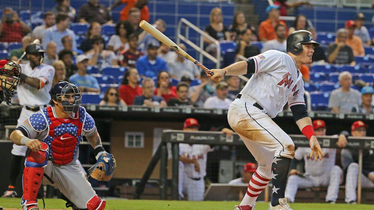 Miami Marlins right baseman Brian Anderson hits a single during the second inning of a Major League Baseball game against the Tampa Bay Rays at Marlins Park on Tuesday, July 3, 2018.