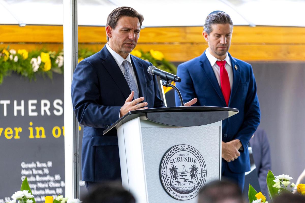 Florida Gov. Ron DeSantis speaks to the crowd during the Second Annual Remembrance Ceremony of the Champlain Towers South building collapse at Veterans Park on Saturday, June 24, 2023, in Surfside, Florida.