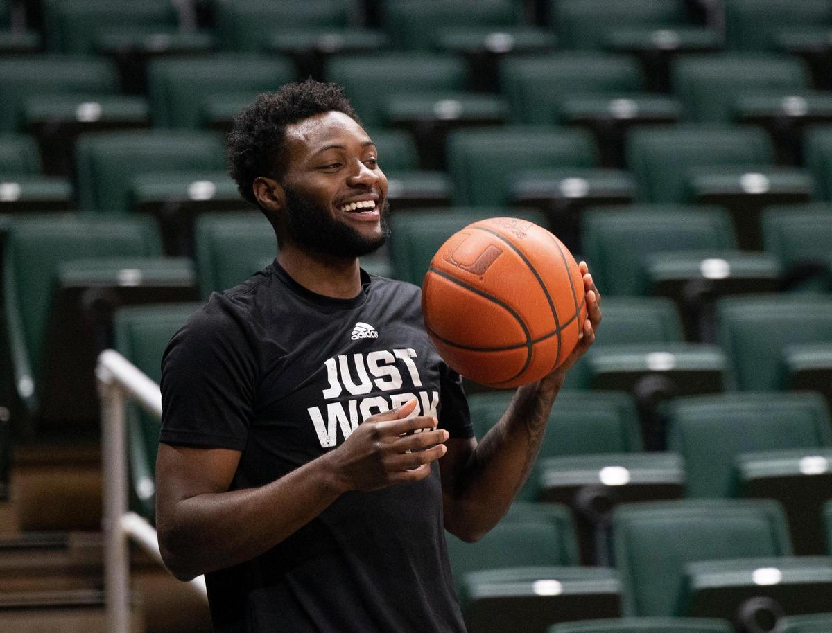 Wooga Poplar (5) attends practice but is currently out with an injury on Monday, Oct. 23, 2023, at the practice facility at Watsco Center in Coral Gables.