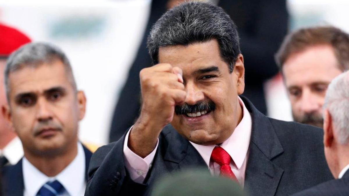 Venezuela’s President Nicolas Maduro greets guests at the National Electoral Council on May 22, 2018