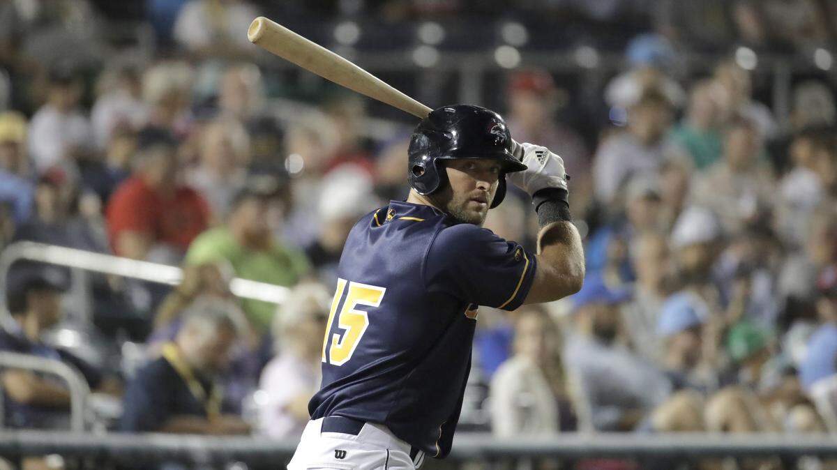 Eastern Division's Tim Tebow swings from the on-deck circle during the ninth inning of the Eastern League All-Star minor league baseball game, Wednesday, July 11, 2018, in Trenton, N.J.