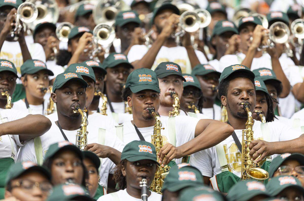The Marching 100 perform as their team Florida A&M Rattlers plays against Howard Bison in the first half of their Orange Blossom Classic football game at Hard Rock Stadium on Saturday, Aug. 30, 2025, in Miami Gardens, Fla.