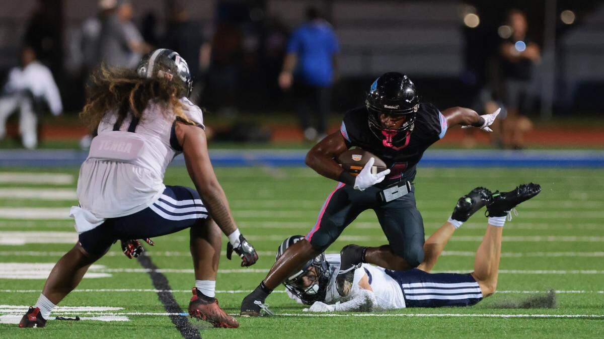 West Broward Bobcats wide receiver Luis Lugo (4) runs with the football against the Corner Canyon Chargers (Utah) during the second half of a high school football game at Dillard High School in Fort Lauderdale, Florida, Friday, August 22, 2025.