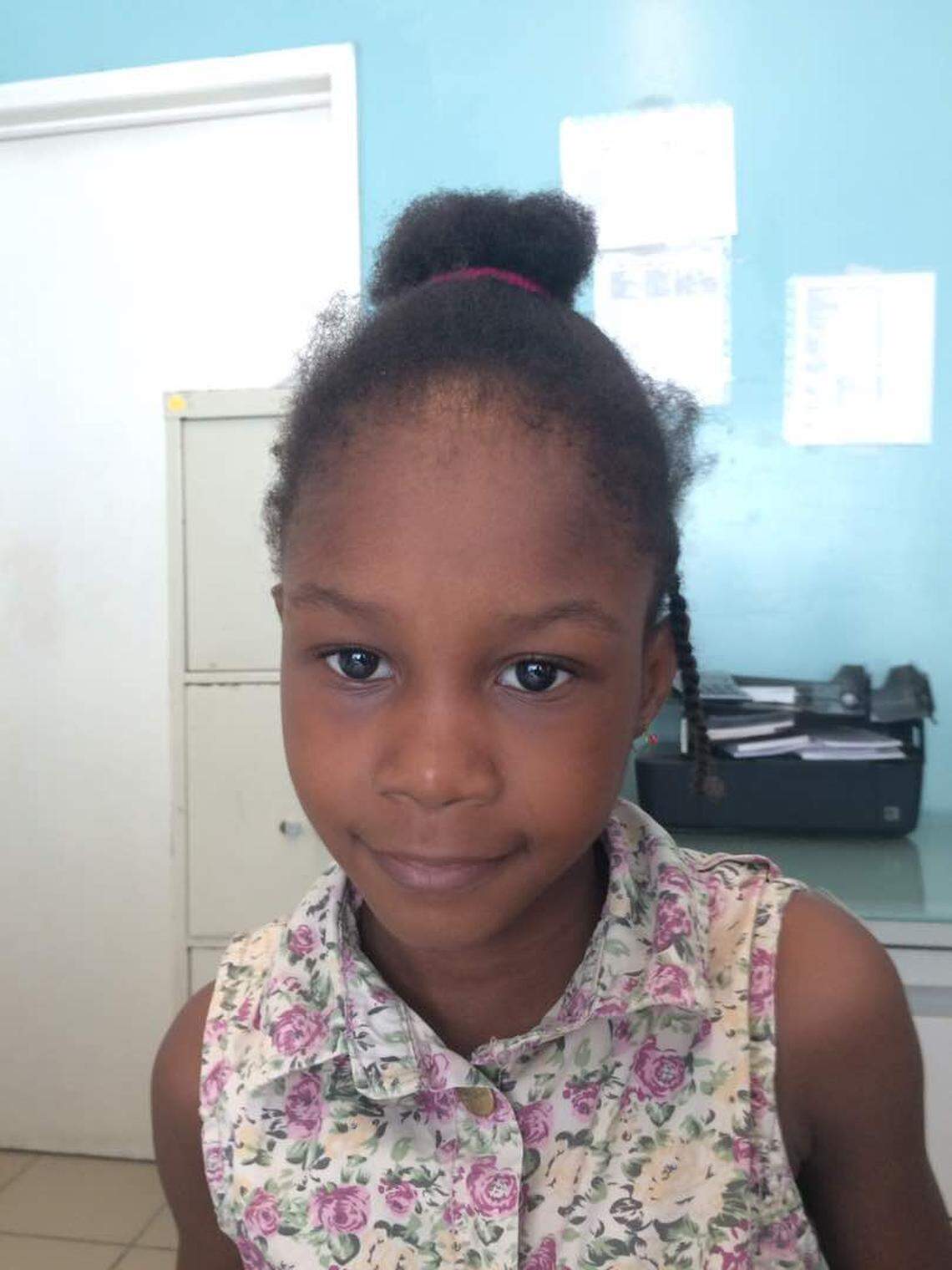 Jonenskia Hector, 8, is in need of heart surgery to repair a hole in her heart. She has been waiting for three months for a passport.