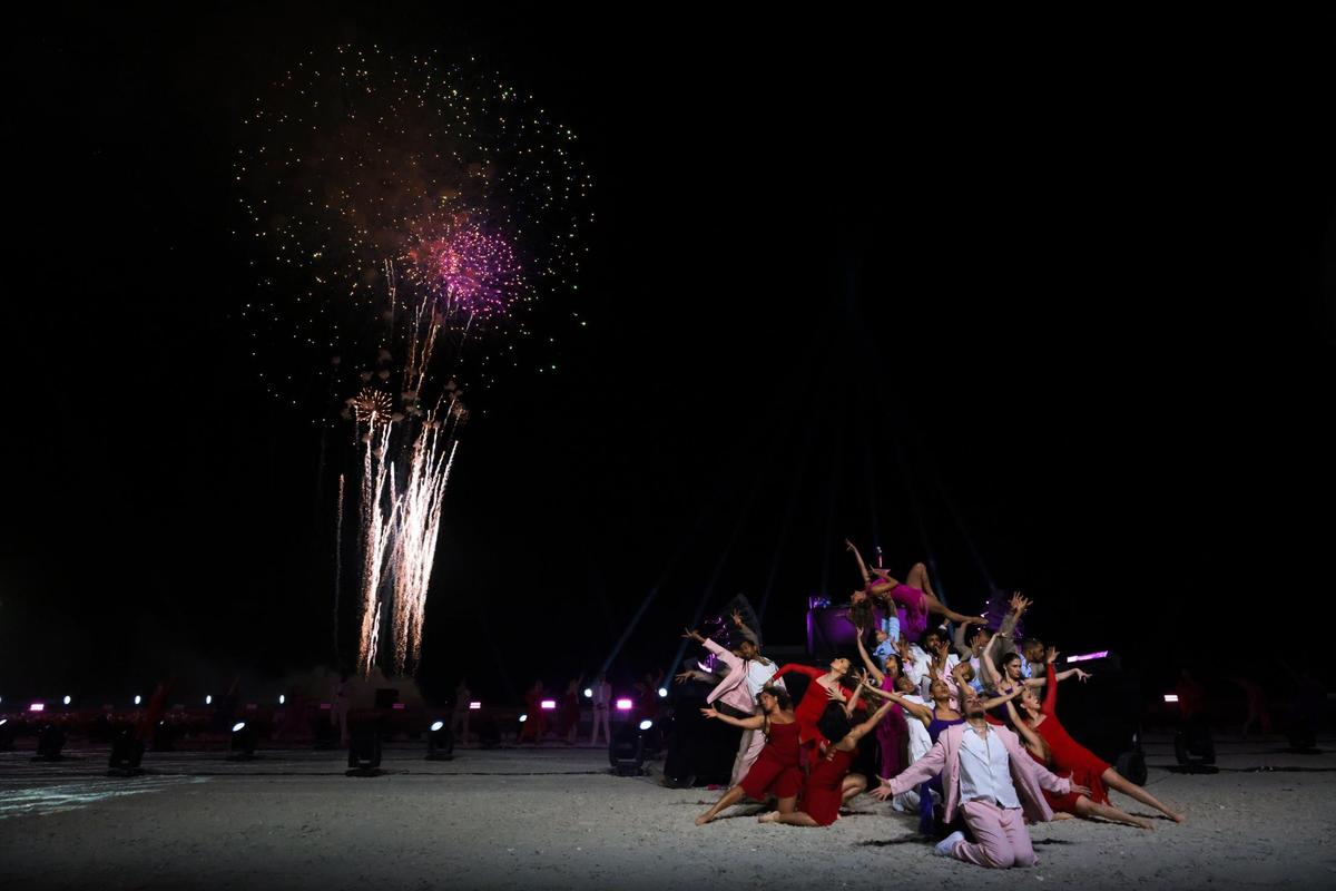 Dancers perform as fireworks explode during the closing ceremony that featured Flo Rida and DJ Khaled at the Global Champions Arabians Tour Miami Beach.
