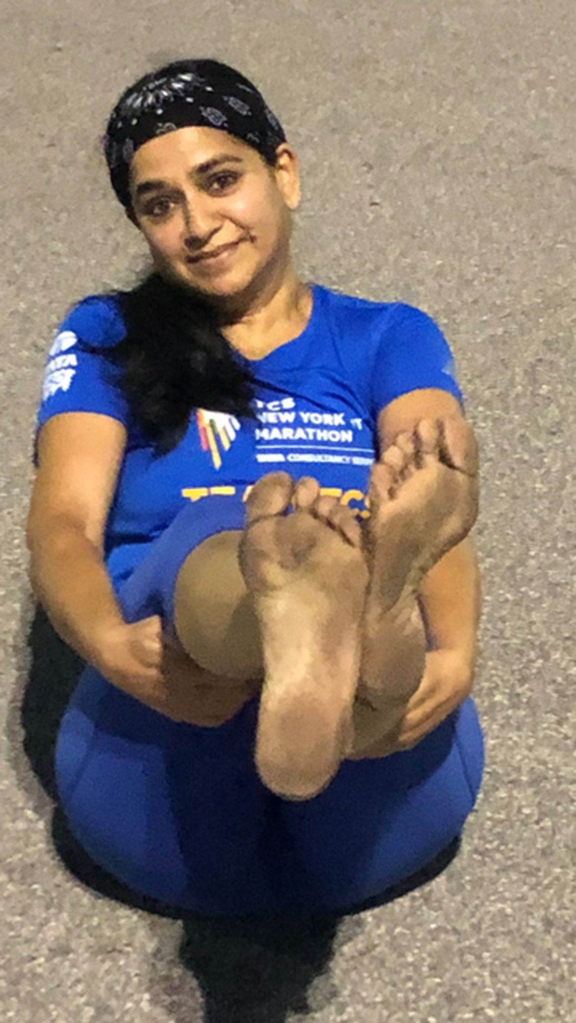 The bottom of barefoot runner Nilima Pai’s feet are shown after a marathon.