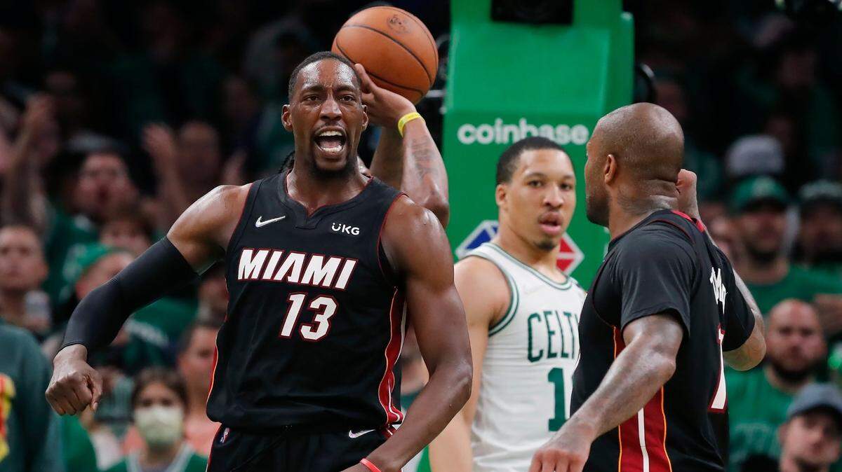 Miami Heat’s Bam Adebayo (13) celebrates after scoring against the Boston Celtics during the second half of Game 3 of the NBA basketball playoffs Eastern Conference finals Saturday, May 21, 2022, in Boston.