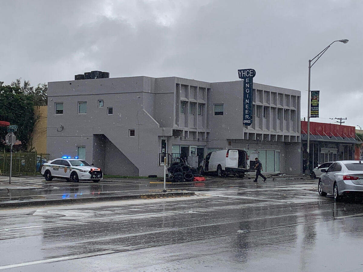 The van that had been pursued by police crashed into the YHCE Engineering building at Northwest 27th Avenue and First Street.