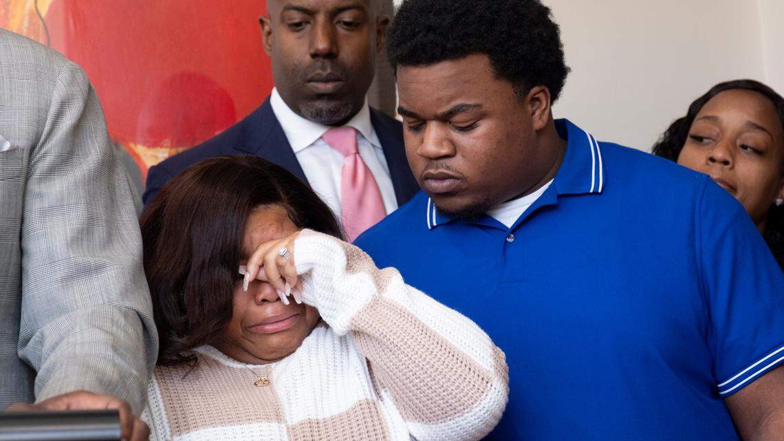 Jessica Ross and Treveon Isaiah Taylor Sr., parents of a baby who was decapitated during delivery, react during a press conference at their lawyers office in Atlanta, Wednesday, Feb. 7, 2024.   