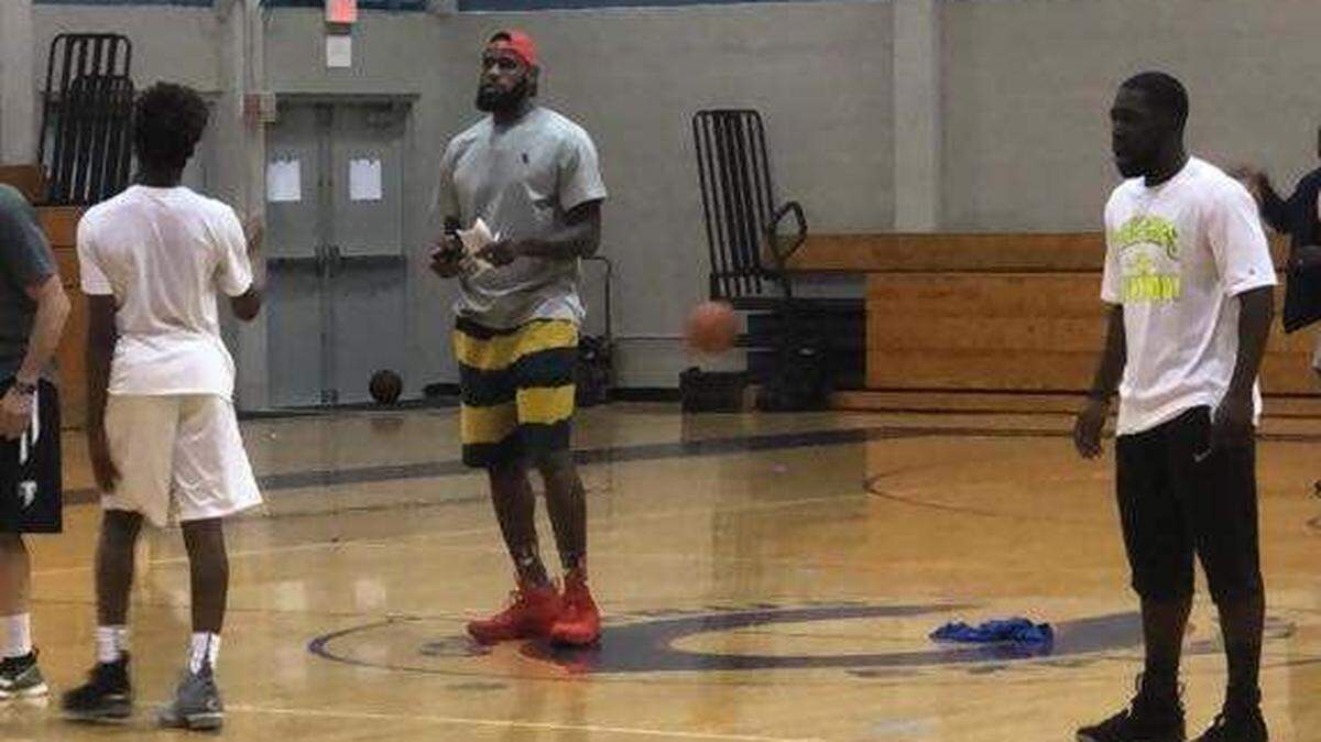 Christopher Columbus High School in Westchester tweeted this photo of Cleveland Cavaliers (and former Miami Heat) star LeBron James playing basketball in its gym on June 22, 2018.