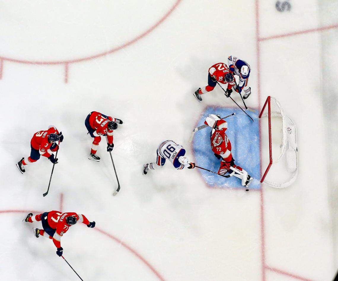 Florida Panthers goaltender Sergei Bobrovsky (72) stops a shot by Edmonton Oilers right wing Corey Perry (90) during the third period of Game 4 in the Stanley Cup Final at Amerant Bank Arena on Thursday, June 12, 2025, in Sunrise, Fla.