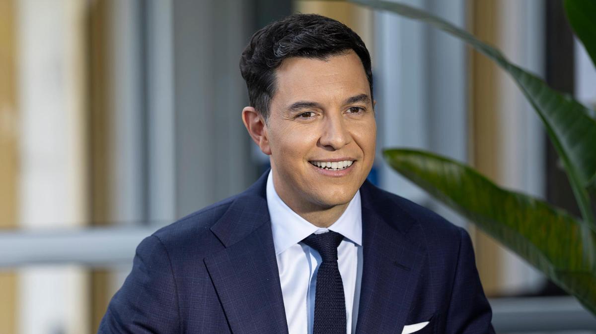 Tom Llamas, a broadcast journalist, is interviewed by Jackie Nespral as he visits the NBC Miami newsroom on Thursday, May 1, 2025, in Miramar, Fla. Llamas, who previously worked at this station,  replaced Lester Holt as the anchor and managing editor of NBC Nightly News.
